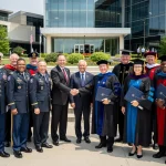 Veterans celebrating educational achievements at a university campus, highlighting the success of education benefits.